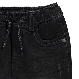 Jean style jogger en denim avec ceinture et chevilles rib garçon 