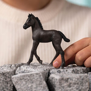 Figurine poulain Frison 