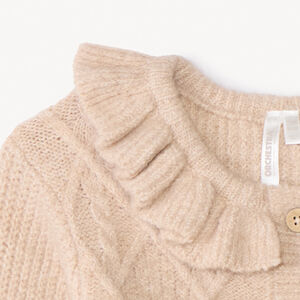 Gilet en tricot torsadé et collerette pour bébé fille 