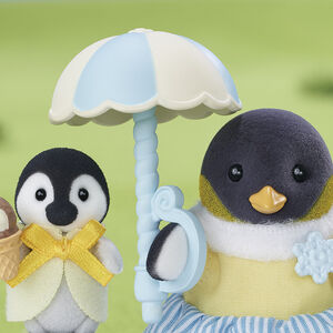 La famille Pingouin avec chariot de glace 