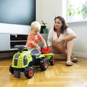 Porteur tracteur Claas Arion 470 avec remorques et outils vert 