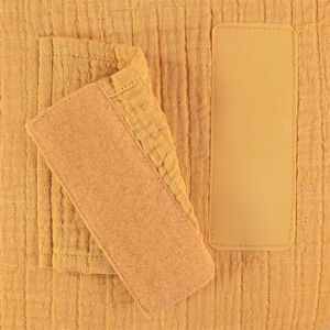 Coussin décoratif rond en tétra modulable en tour de lit ou de parc 