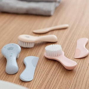 Brosse et peigne rose 