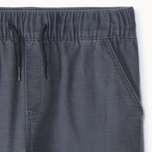 Jean jogger style cargo uni à poches pour garçon 