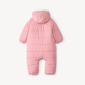 Combi-pilote matelassée pour bébé fille avec finitions différentes selon l'âge 