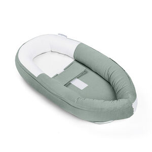 Cale-bébé et réducteur de lit ajustable Cocoon en tetra green 