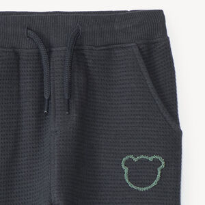Pantalon de jogging bébé garçon en maille nid d'abeille motif ourson 