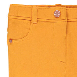 Jegging uni à bouton gravé 