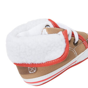 Baskets souples à lacets avec fausse fourrure 