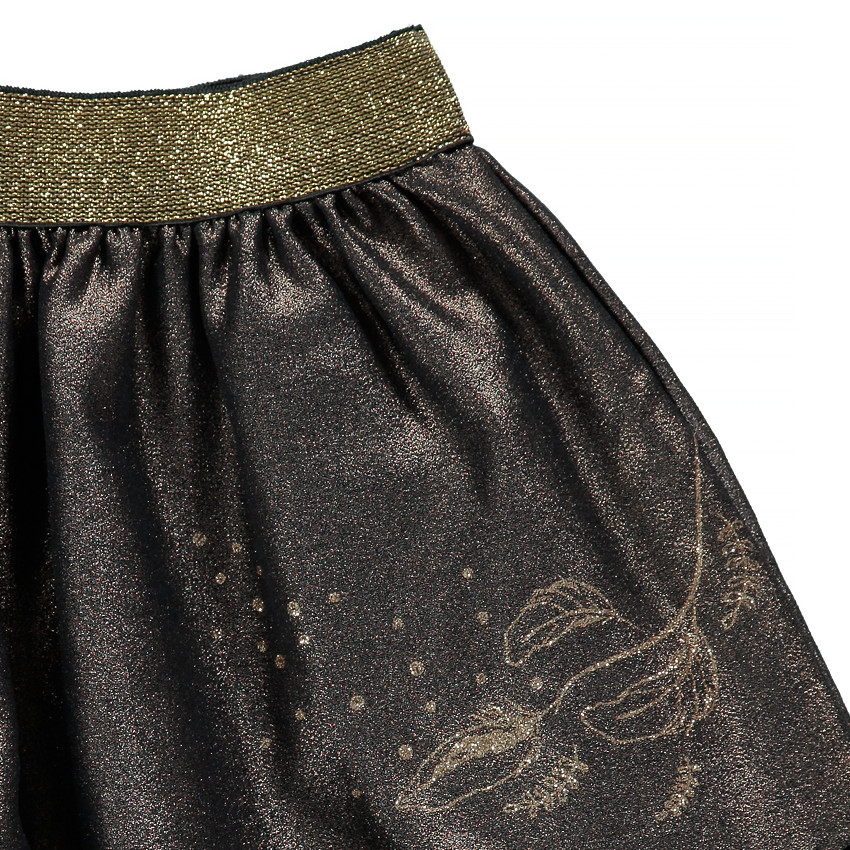 Jupe en tissu irisé et volant en tulle 