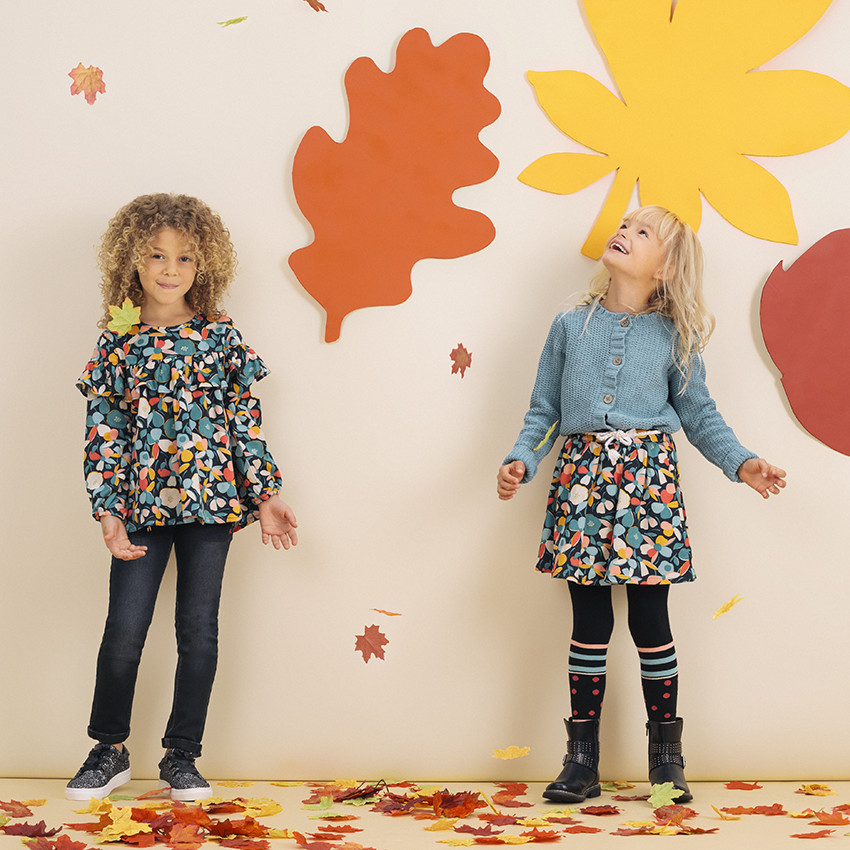 Jupe fluide à motif floral all-over et ceinture tressée 