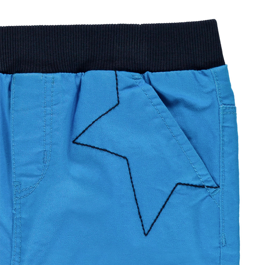 Pantalon bleu à étoiles brodées 