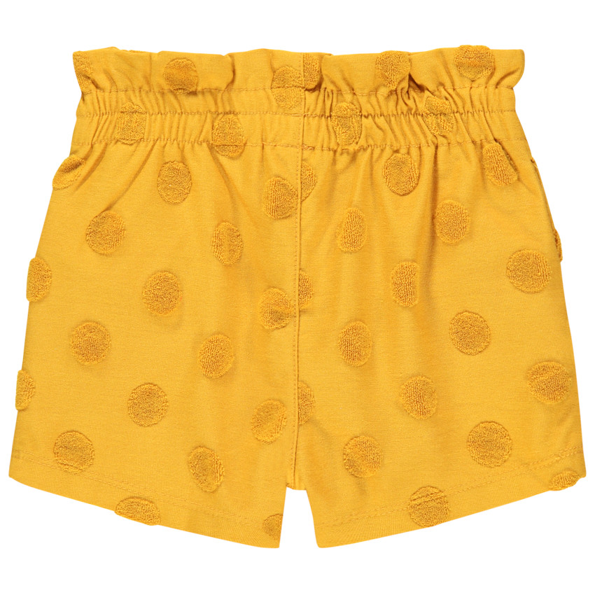 Short jaune à pois en relier et noeud rose 