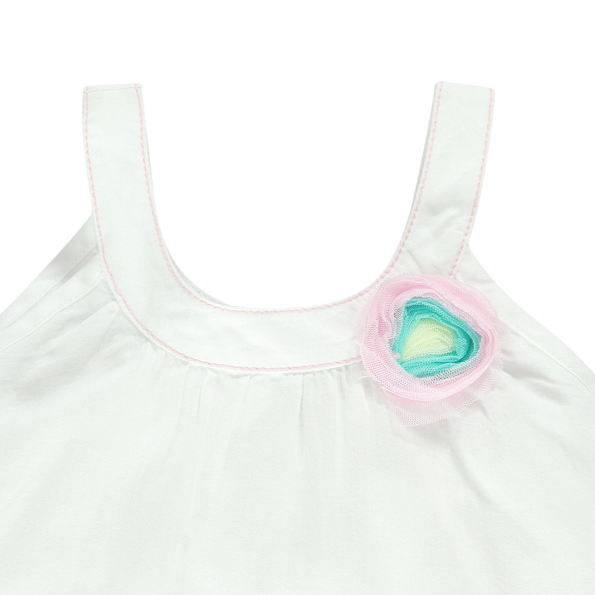 Tunique blanche satinée avec fleur en tulle 