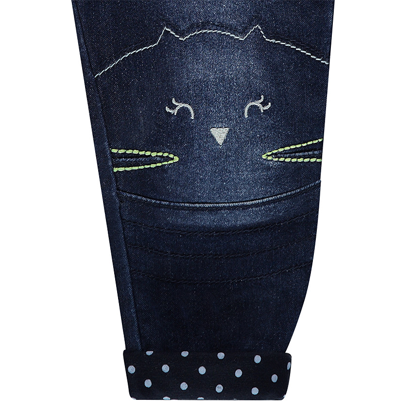 Jeans effet used doublé jersey avec têtes de chat brodées 