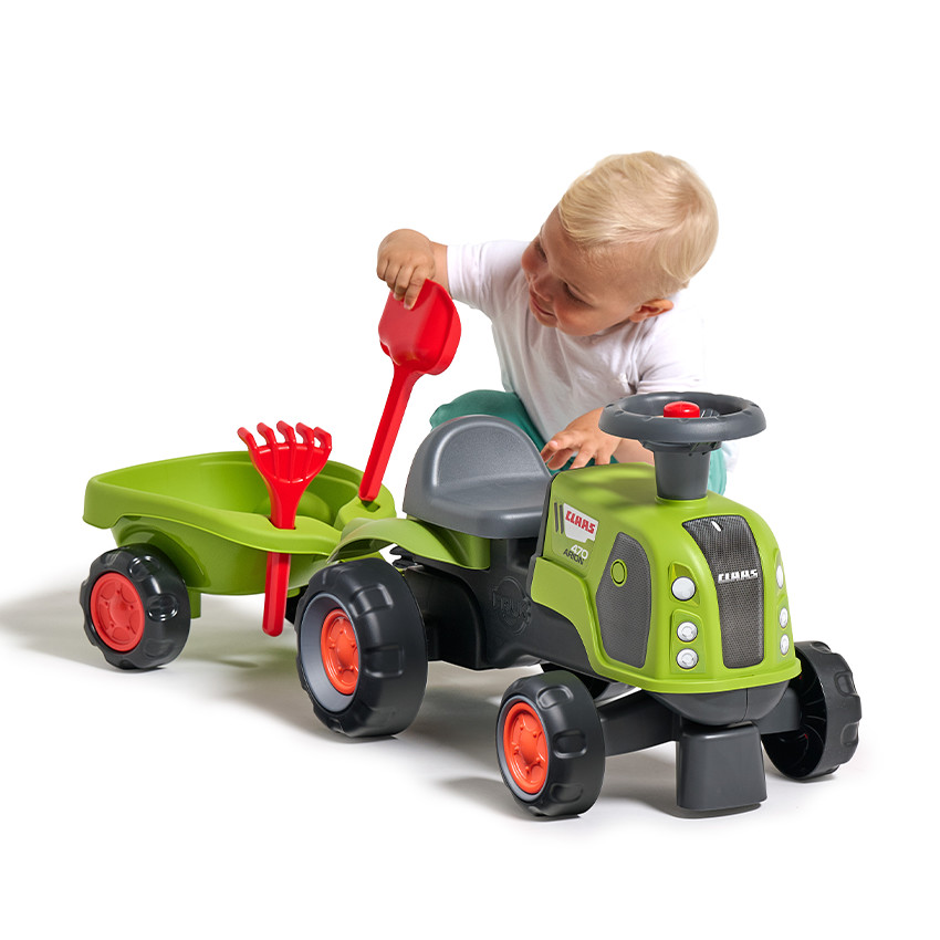 Porteur tracteur Claas Arion 470 avec remorques et outils vert 