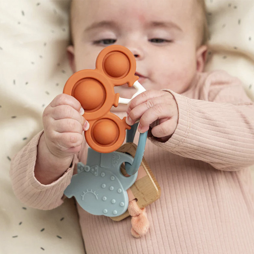 Jouet sensoriel en anneau d'activités Célébration 