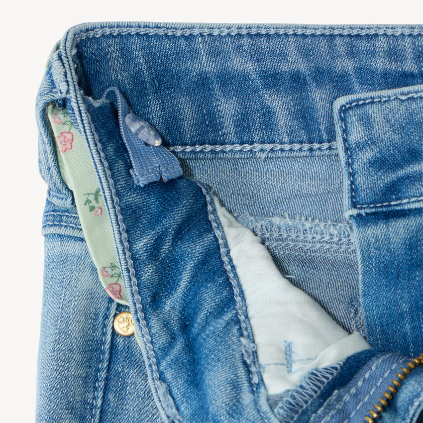 Jean slim fille avec ceinture en tissu 