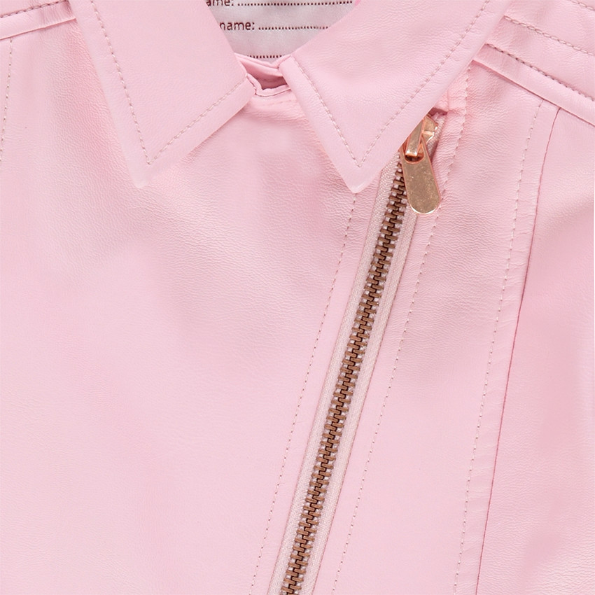 Perfecto en simili cuir rose avec poches zippées 