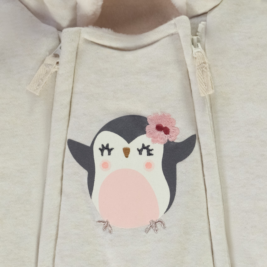 Combi-pilote print pingouin pour bébé fille avec finitions différentes selon l'âge 