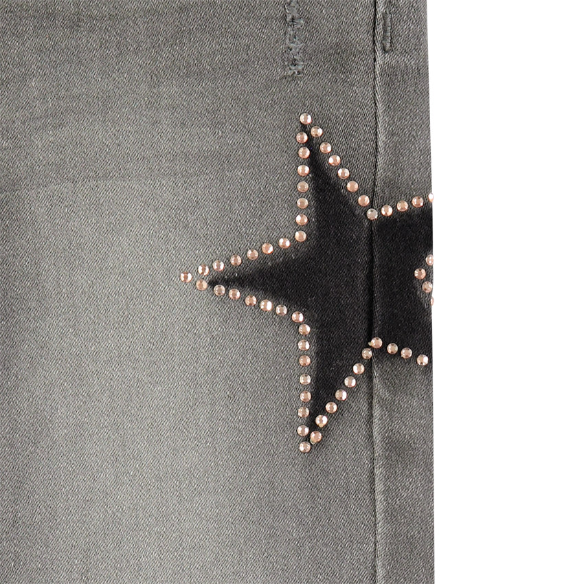 Jean slim à étoiles et strass fantaisie 