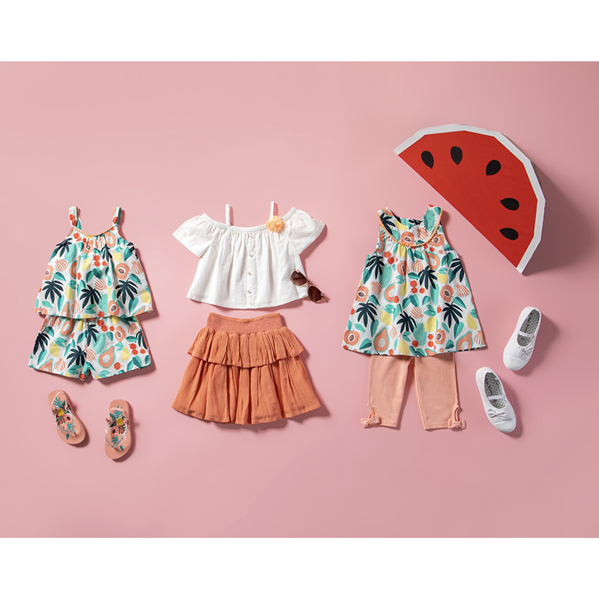 Top court en maille fantaisie avec fleur orange pour fille 