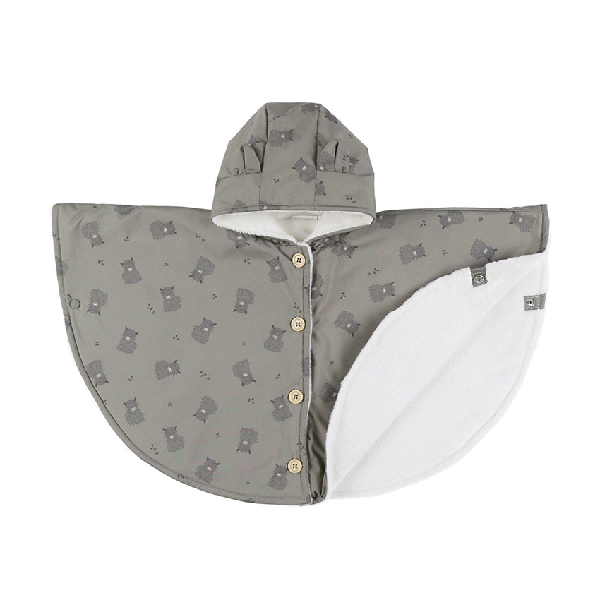 Poncho ludique déperlant imprimé vaches kaki