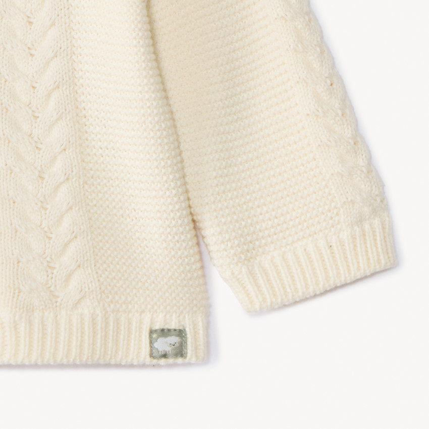 Gilet en tricot torsadé et doublé jersey pour bébé 