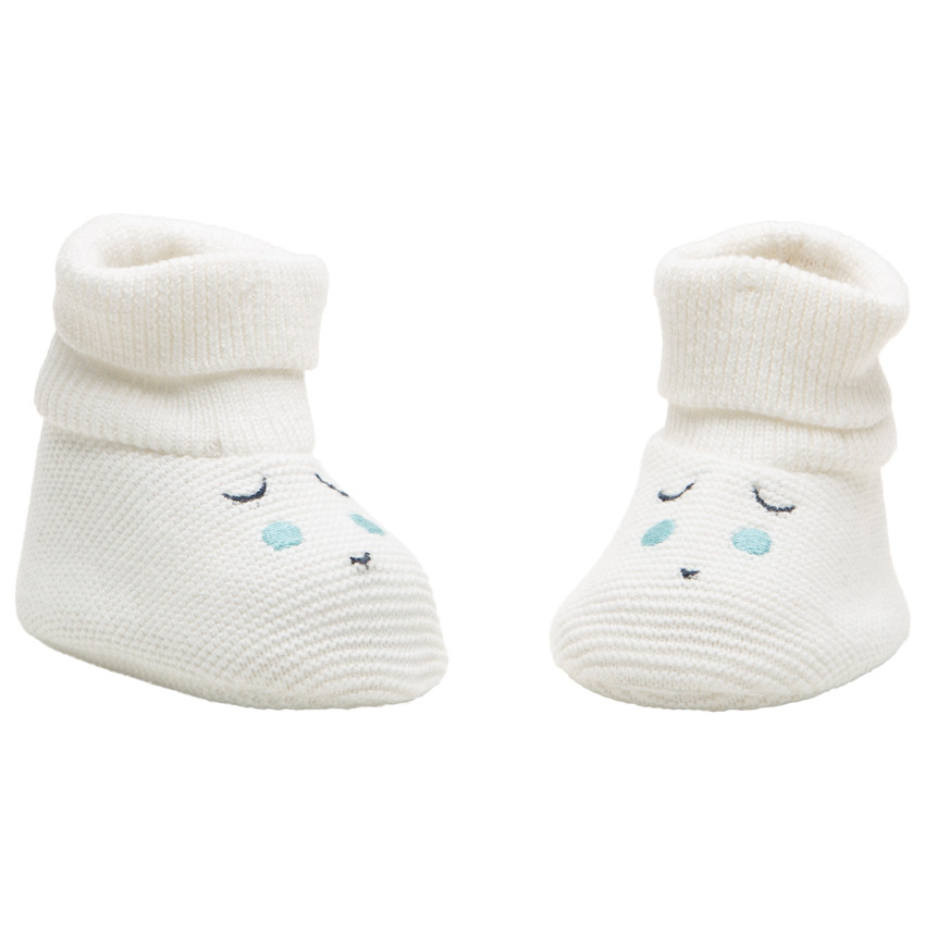 Chaussons en tricot à détails brodés 
