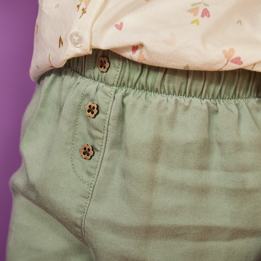 Pantalon en toile avec boutons fleurs pour bébé fille 