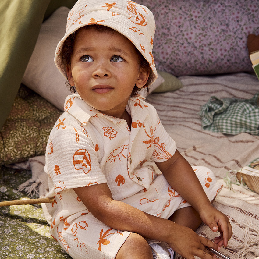 Combinaison courte en tetra imprimé vacances pour bébé garçon 