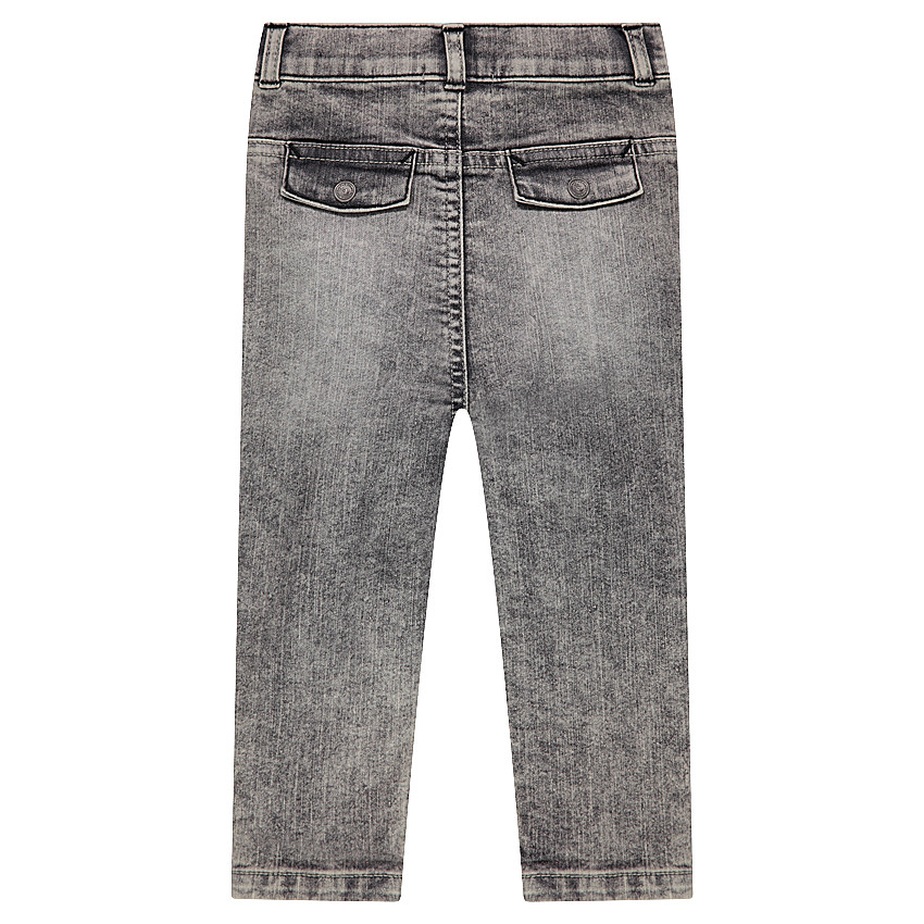Jeans effet neige used avec badges et prints 