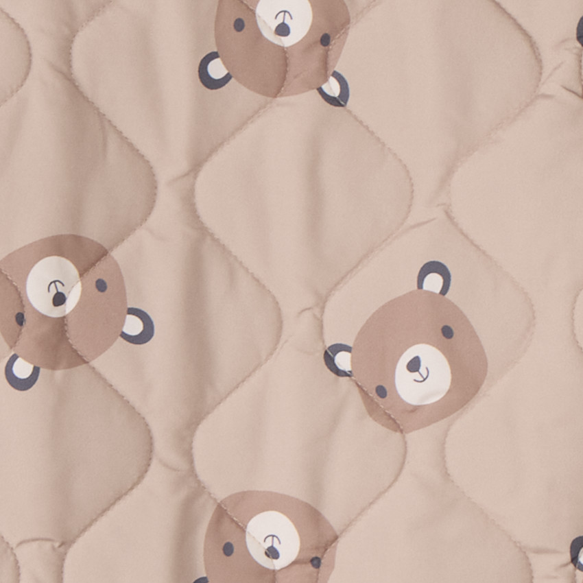 Combi-pilote imprimé oursons pour bébé avec finitions différentes selon l'âge 