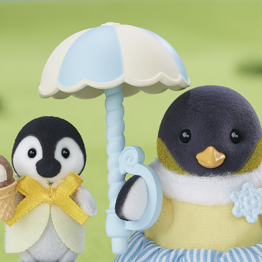 La famille Pingouin avec chariot de glace 