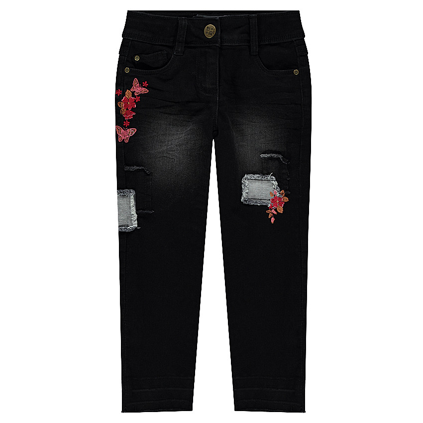 Jeans effet used avec broderies florales 