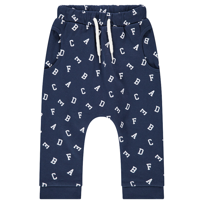 Pantalon de jogging en molleton forme sarouel avec lettres all-over 