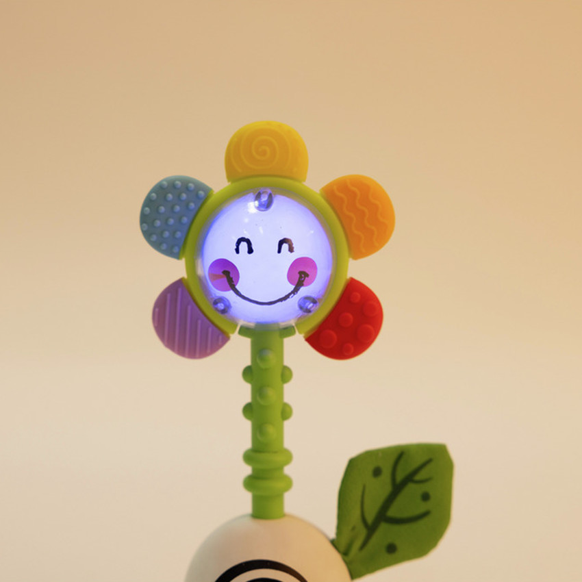 Hochet fleur lumineux et musical 