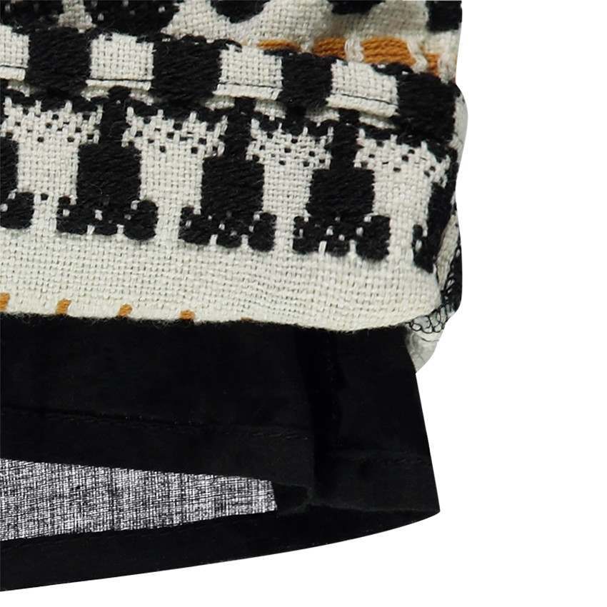 Jupe courte avec motif jacquard et franges 