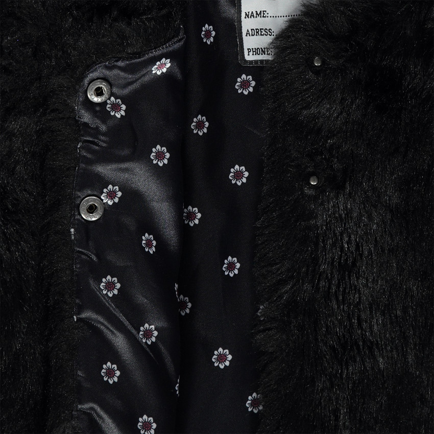 Veste noire en fausse fourrure 
