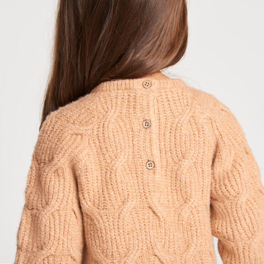 Robe bébé fille en tricot torsadé avec nœuds 