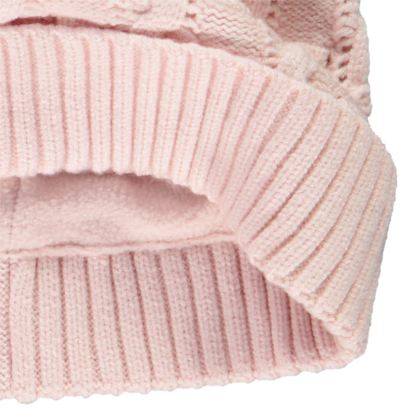 Bonnet en tricot torsadé avec pompon pour fille 