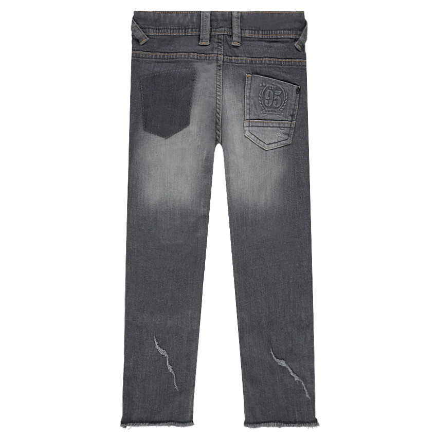 Jeans coupe slim effet used avec usures fantaisie 