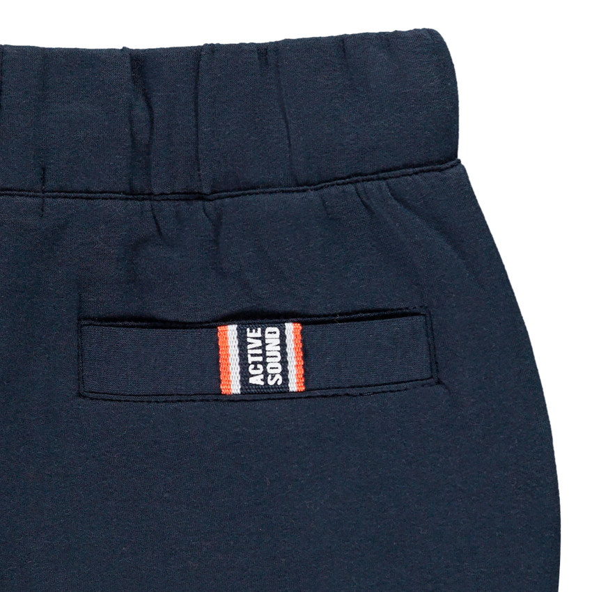 Jogging bleu marine et touches d'orange pour enfant garçon 