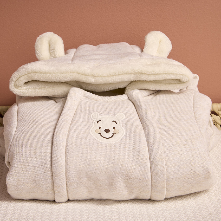 Combi-pilote Winnie Disney pour bébé avec finitions différentes selon l'âge 