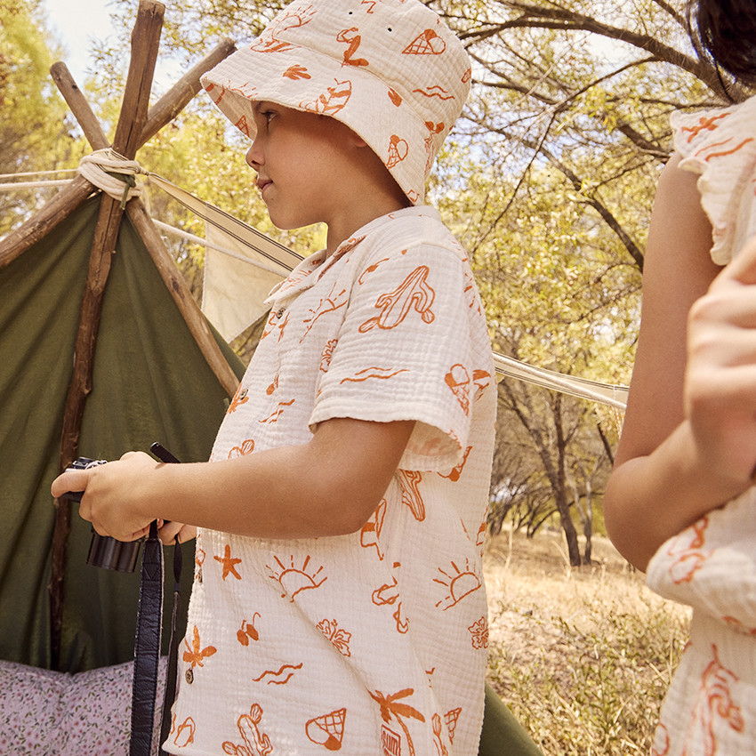 Combinaison courte en tetra imprimé vacances pour bébé garçon 