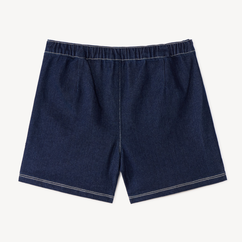 Jupe-short plissé en denim fille avec boucle cœur à strass 
