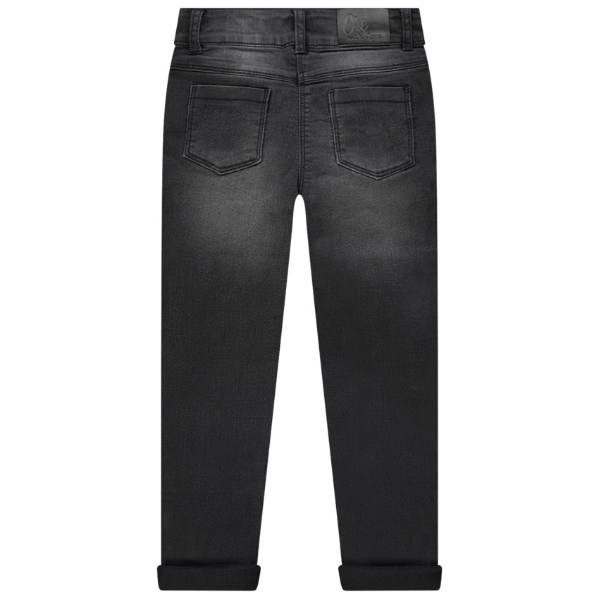 Jean slim effet used à perles fantaisie 