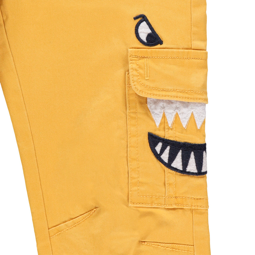 Pantalon cargo jaune à ceinture amovible et broderies 