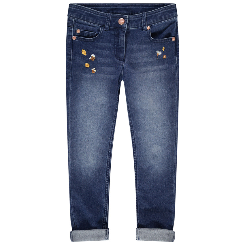 Jean slim effet used à broderies florales 