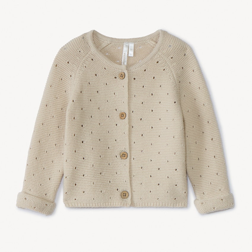 Gilet en tricot point mousse ajouré pour bébé